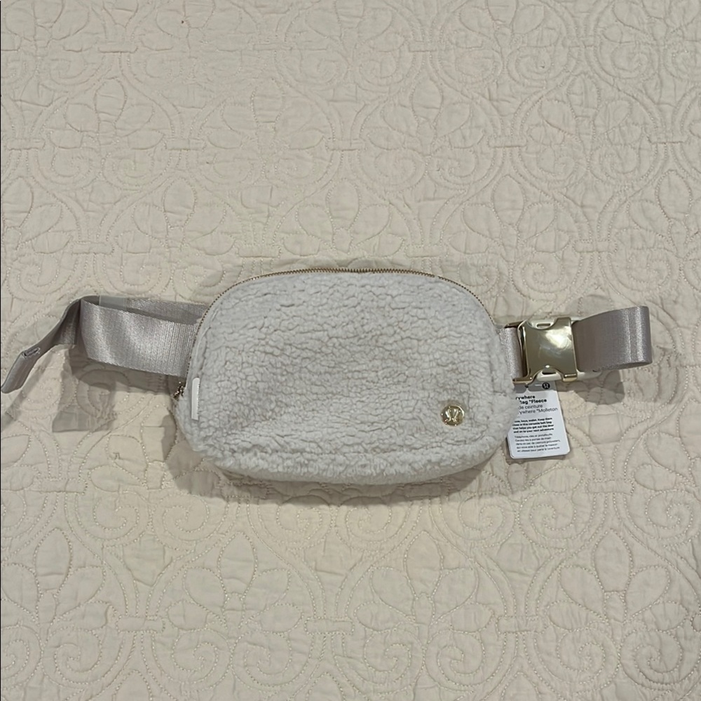 Lululemon Cream Crossbody Bag with Soft Material and Adjustable Strap